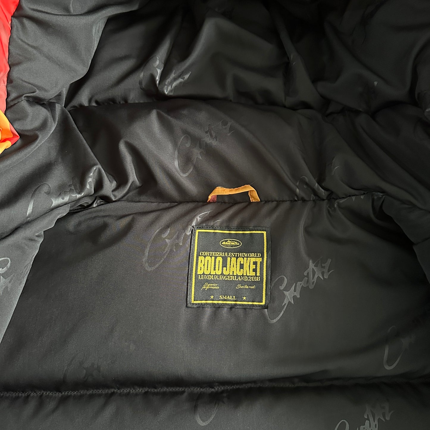 Corteiz Bolo Jacket Orange/Black/Yellow